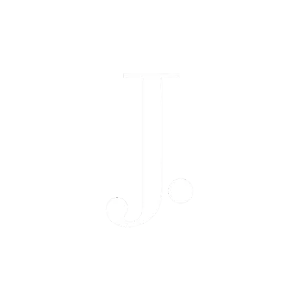 J.
